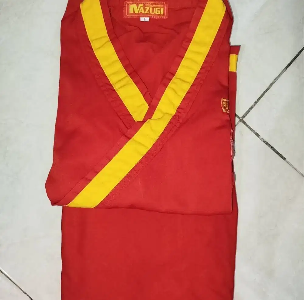 Preloved Seragam Tapak Suci Putri Size S (4-6SD)