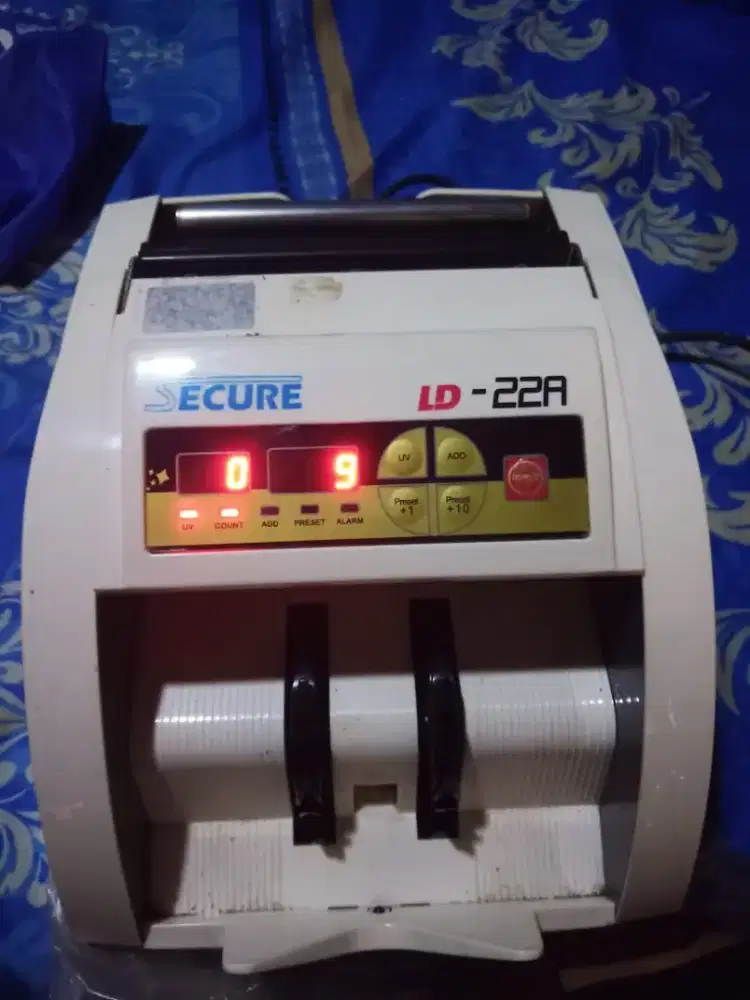 Mesin uang merk secure