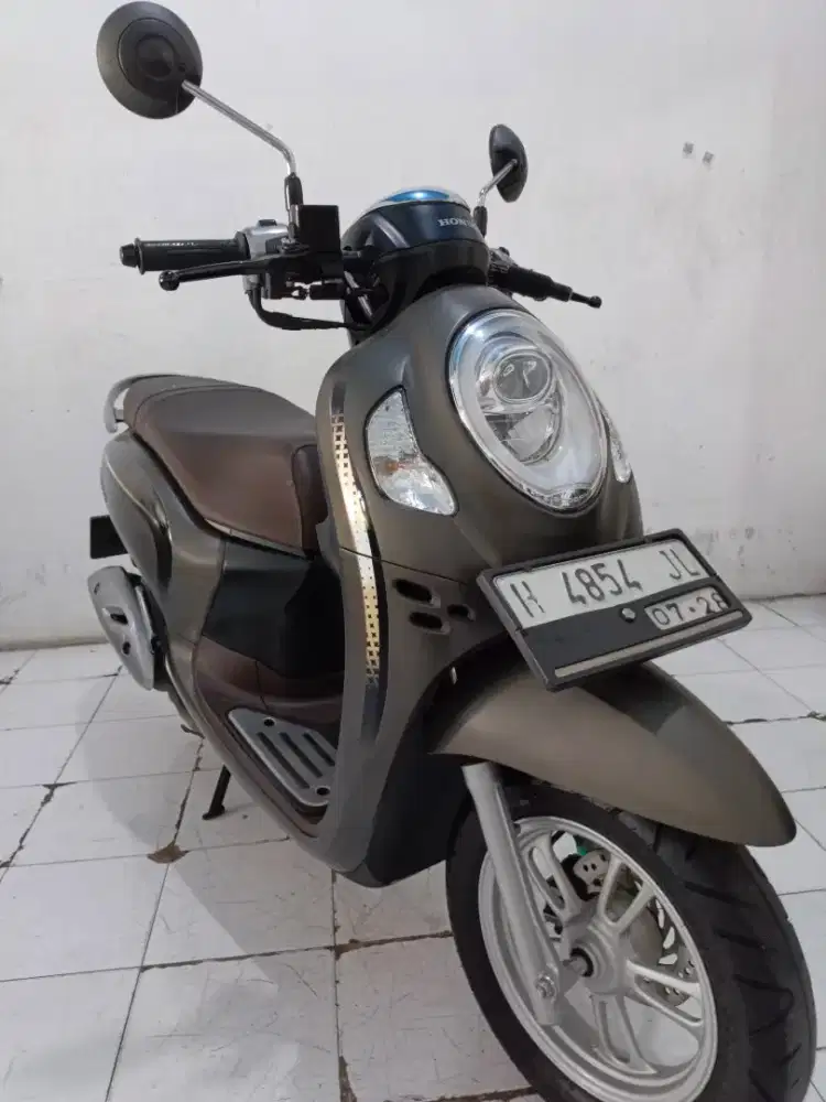 scoopy 2023 coklat