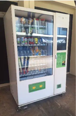 dijual murah vending machine minuman dan makanan masih bagus