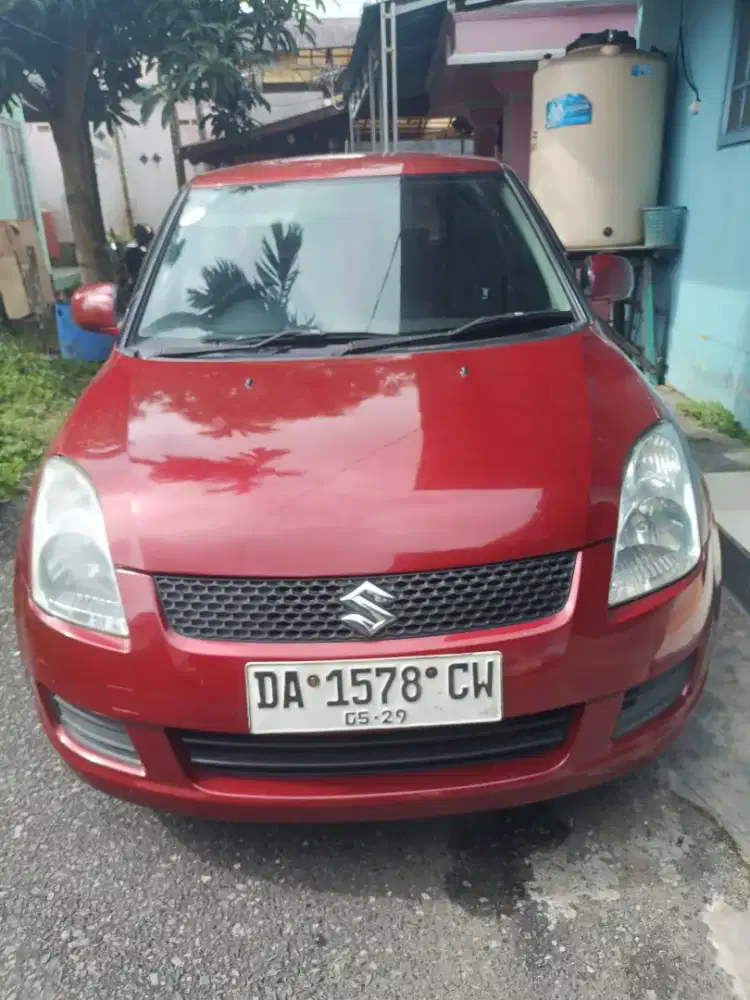 Suzuki Swift 2009 red