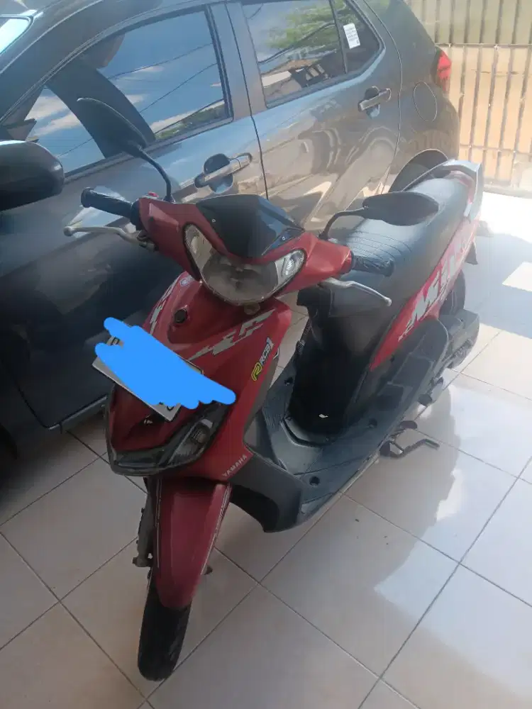 Mio smile 2010 merah