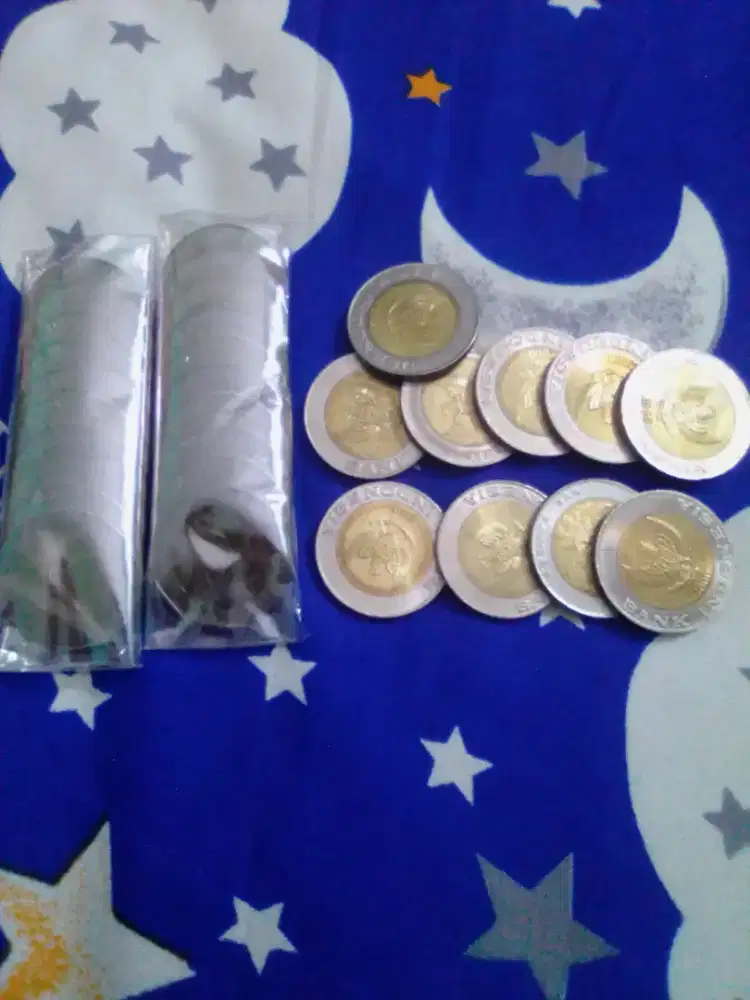 Uang 1000 koin kelapa sawit