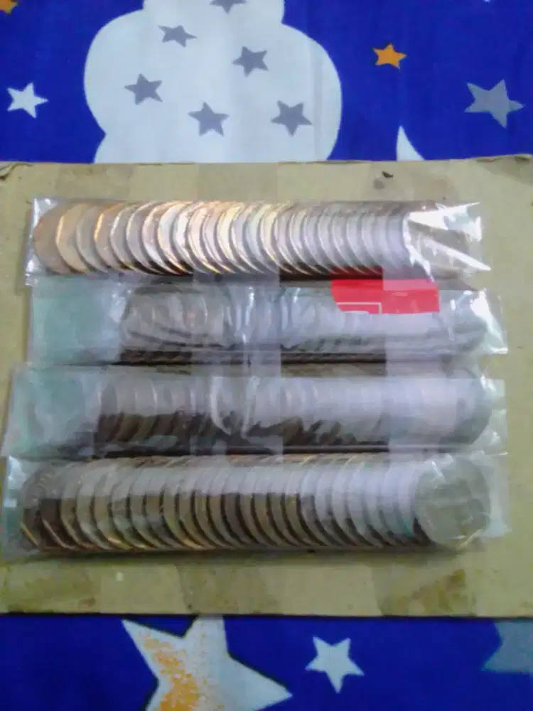 Uang Koin 100 rupiah karapan sapi
