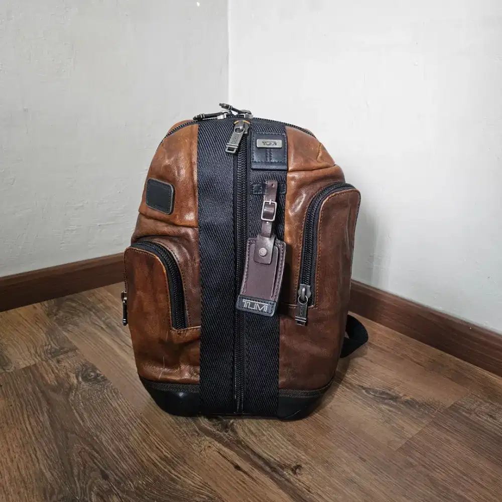 Tumi saratoga leather slingbag