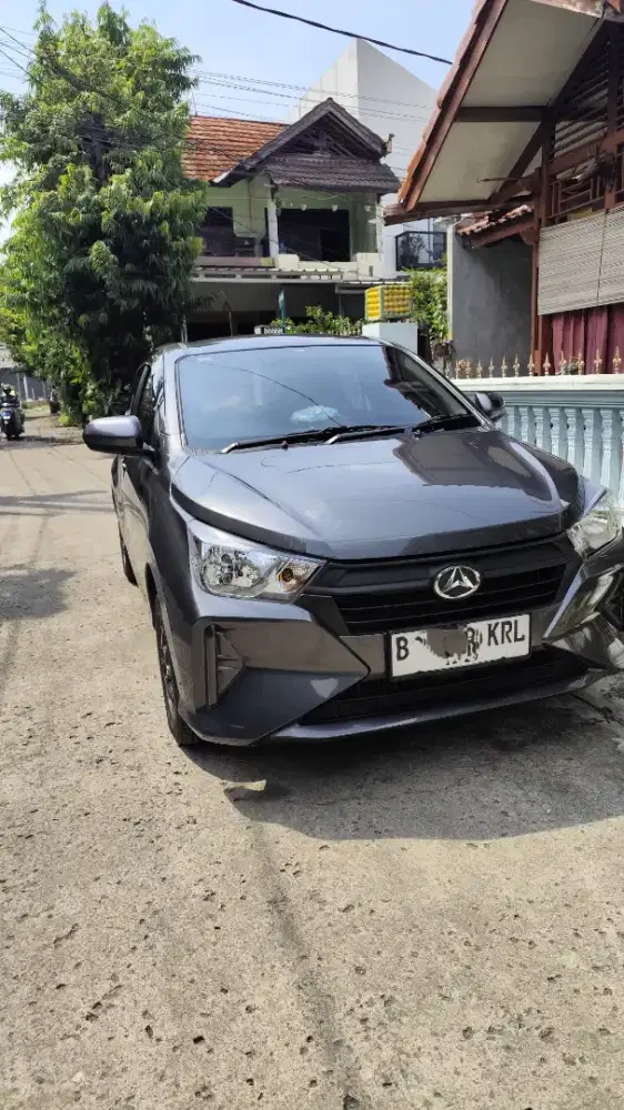 Over Kredit Ayla 2024 akhir X 1.0 MT