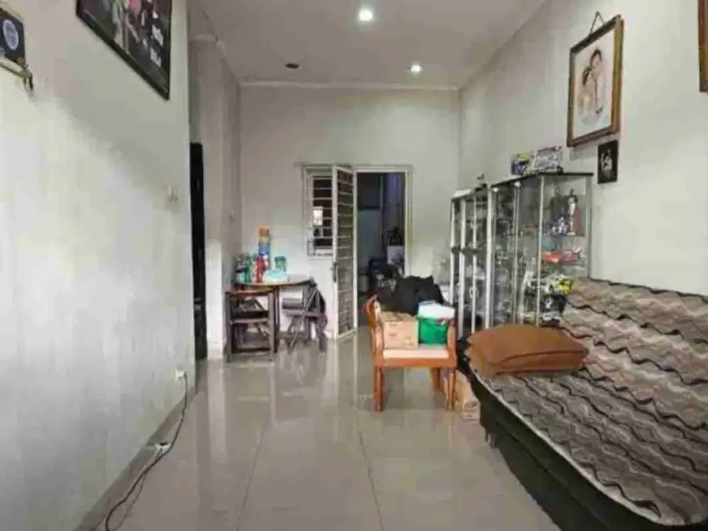 dijual rumah murah 1 lantai siap huni bebas banjir hadap taman di puri gardena kalideres