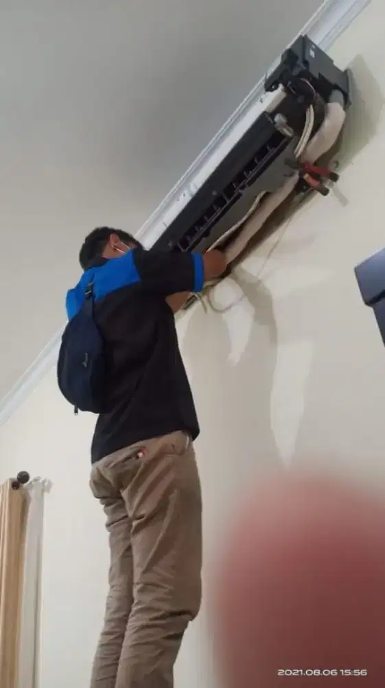 Tukang service AC keliling bongkar pasang AC service kulkas,mesin cuci