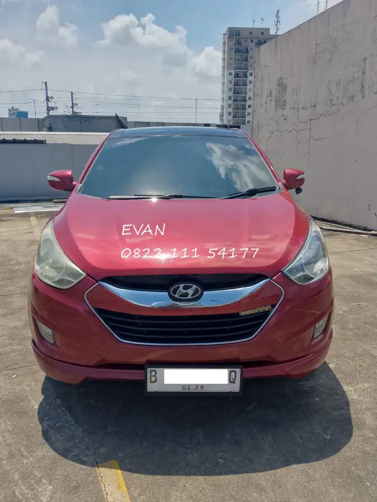 Hyundai Tucson 2.0 XG Sunroof Panoramic AT Matic 2013 Merah Metalik.