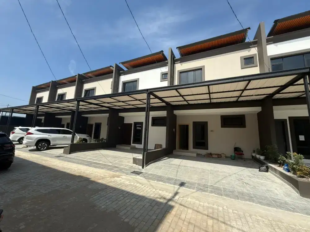 DIJUAL TOWNHOUSE EXCLUSIVE SIAP HUNI LOKASI DEMANG LEBAR DAUN
