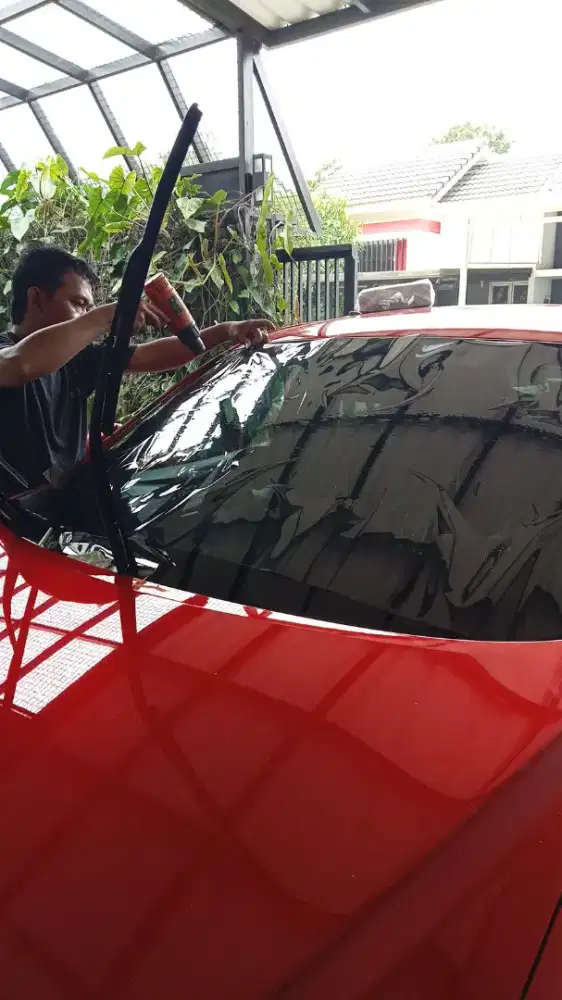 Melayani bongkar pasang kaca film mobil