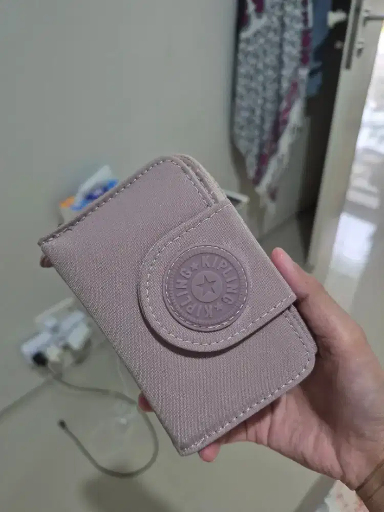 dompet kipling ungu muda