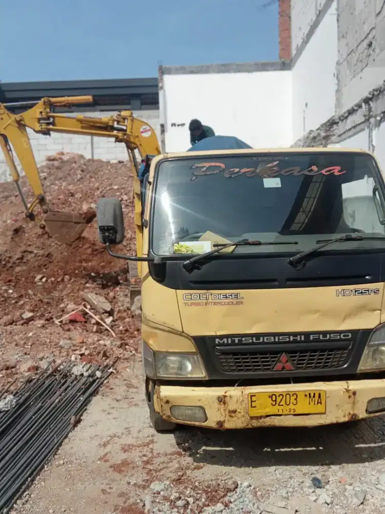 Tanah campur buang puing campur tanah