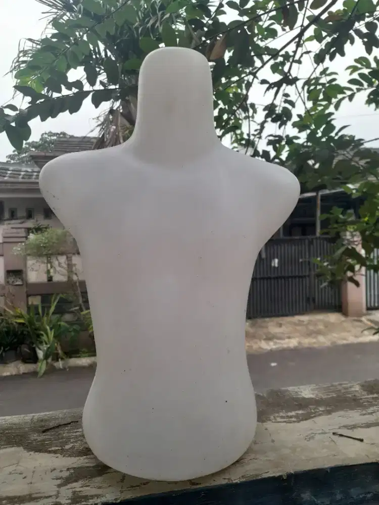 Patung baju anak