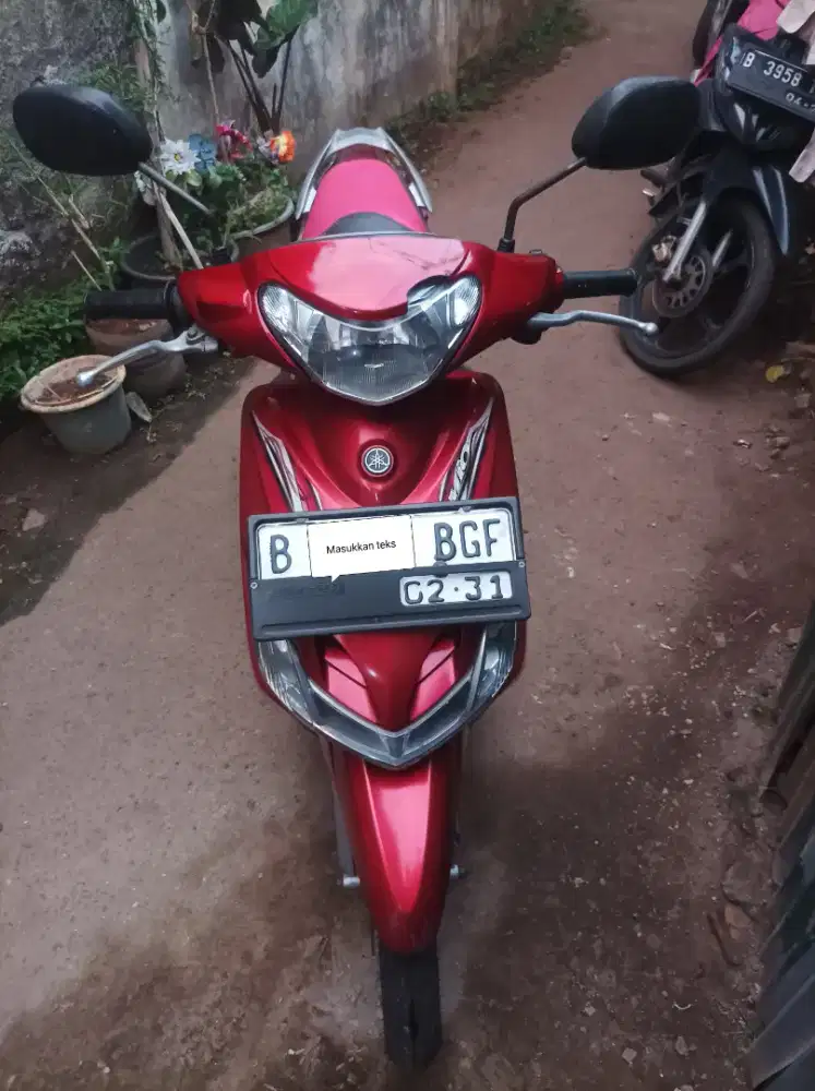 Mio smile 2011 merah merona