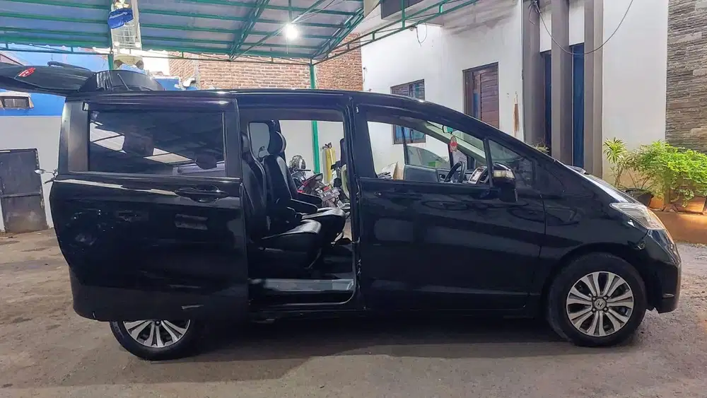 DP 9 JT Honda Freed E PSD 1.5 AT AC Double 2014 Mulus