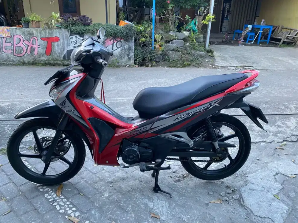 Honda Supra helm in injeksi THN 2012 plat AB Sleman