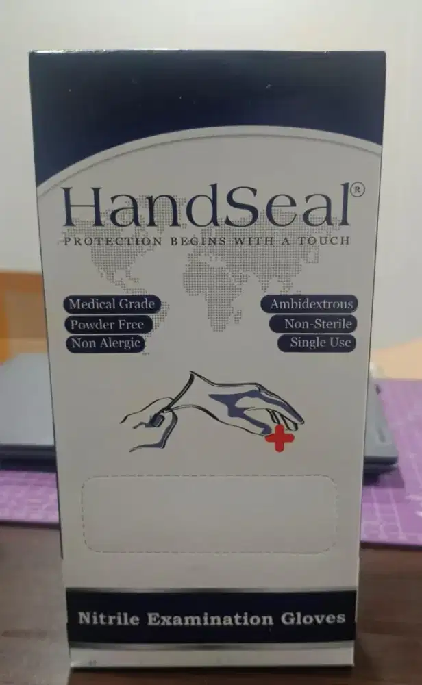 Sarung tangan karet medis