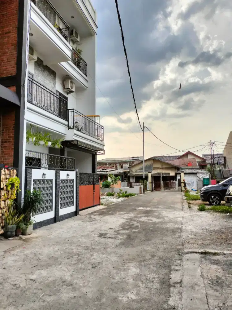 DI JUAL RUMAH BARU SHM DI JL. H. BUANG LUBANG BUAYA - DEKAT LRT & TOLL