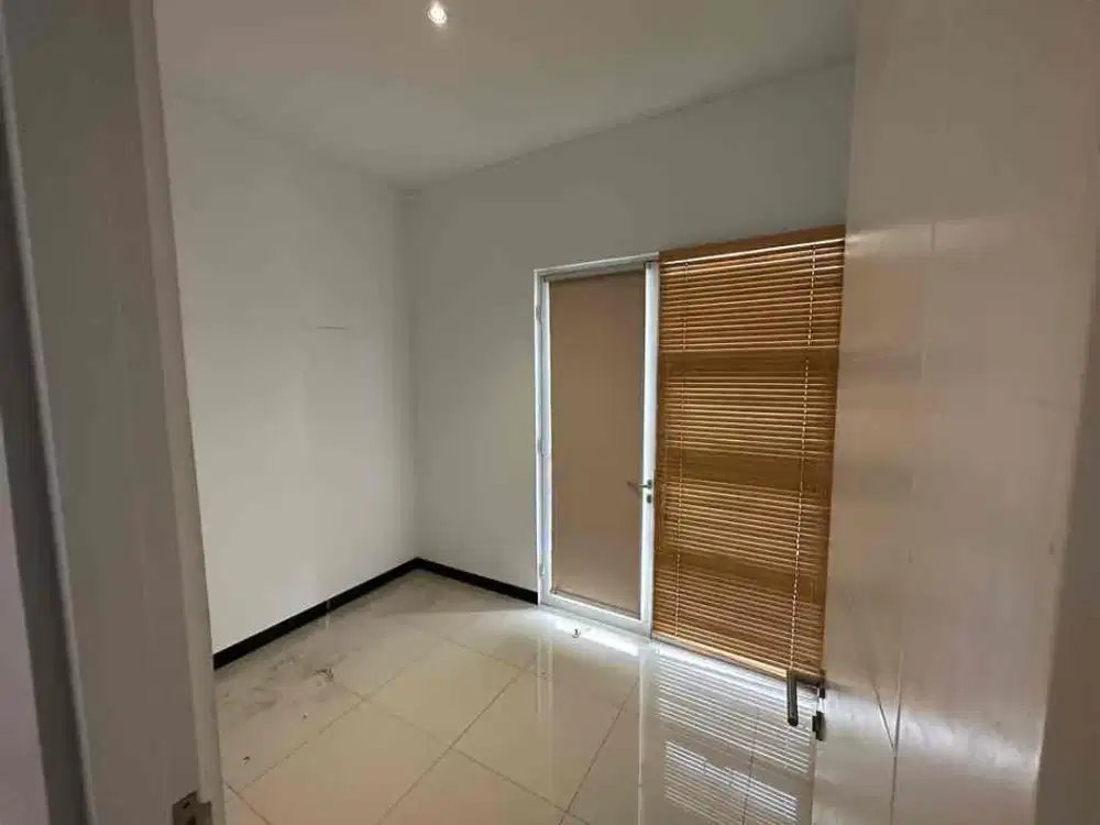 sewa rumah 2 lantai non furnished taman kopo indah 5