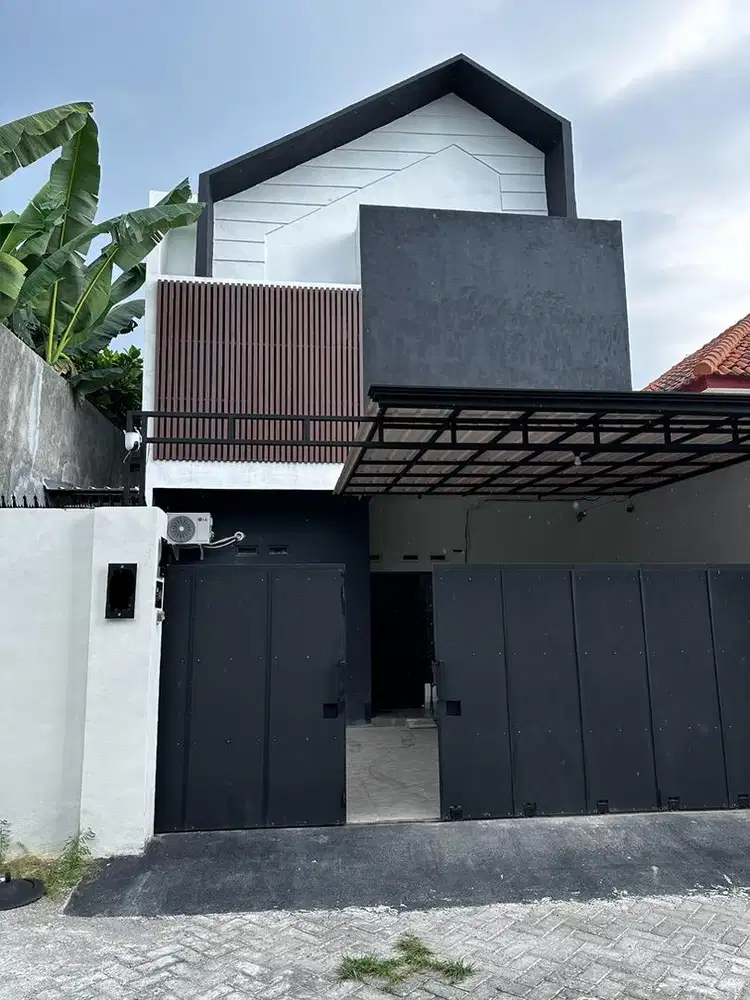 Rumah di kota madiun 2 lantai minimalis