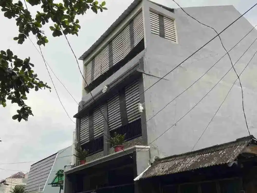 rumah 3 lantai depan taman, bebas banjir di taman malaka, pondok kelapa