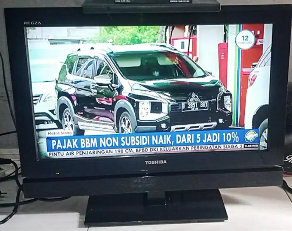 TV 32 INC LED TOSHIBA+STB DIGITAL(49CHANEL TV) BAGUS NORMAL GBR BENING