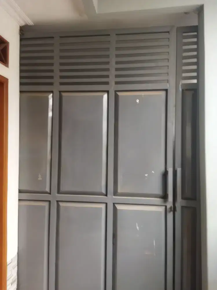 Pagar garasi rumah
