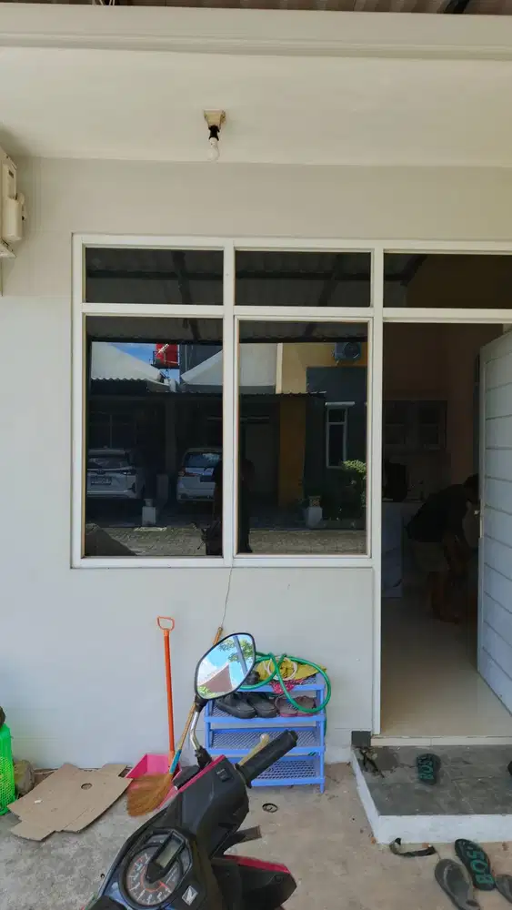 Vendor kaca film cutting stiker rumah sticker kantor sanblast gedung