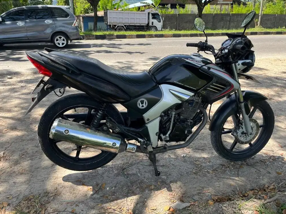 Tiger revo tahun 2008 surat lengkap