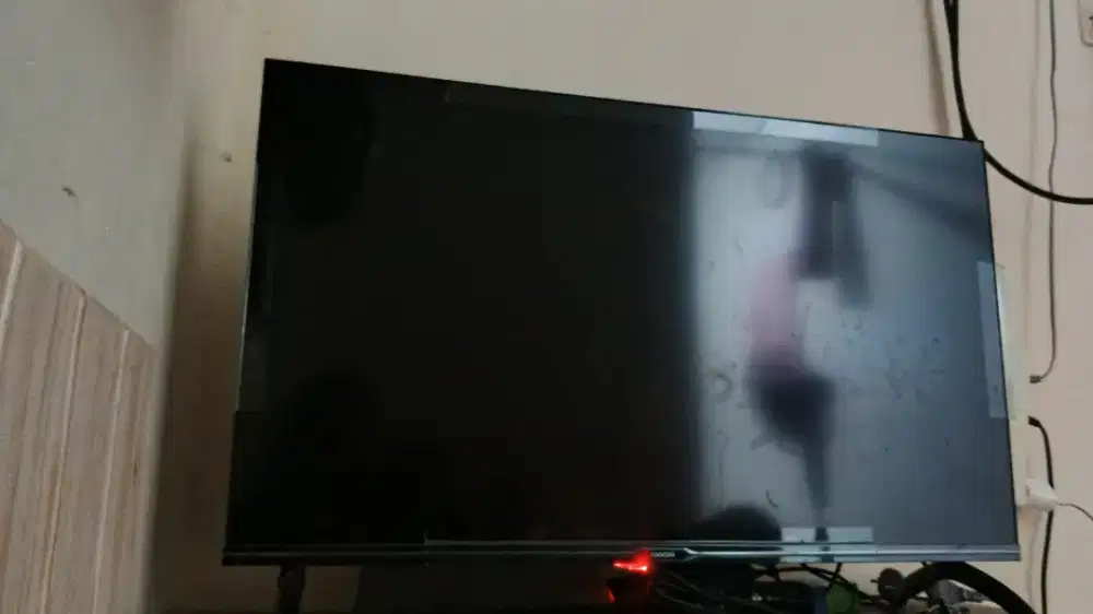 Televisi smart merek coocaa
