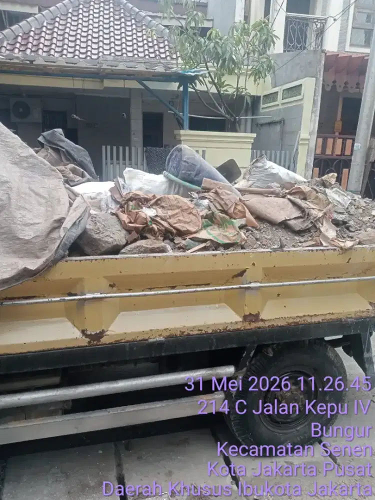 Jasa buang puing dan tanah
