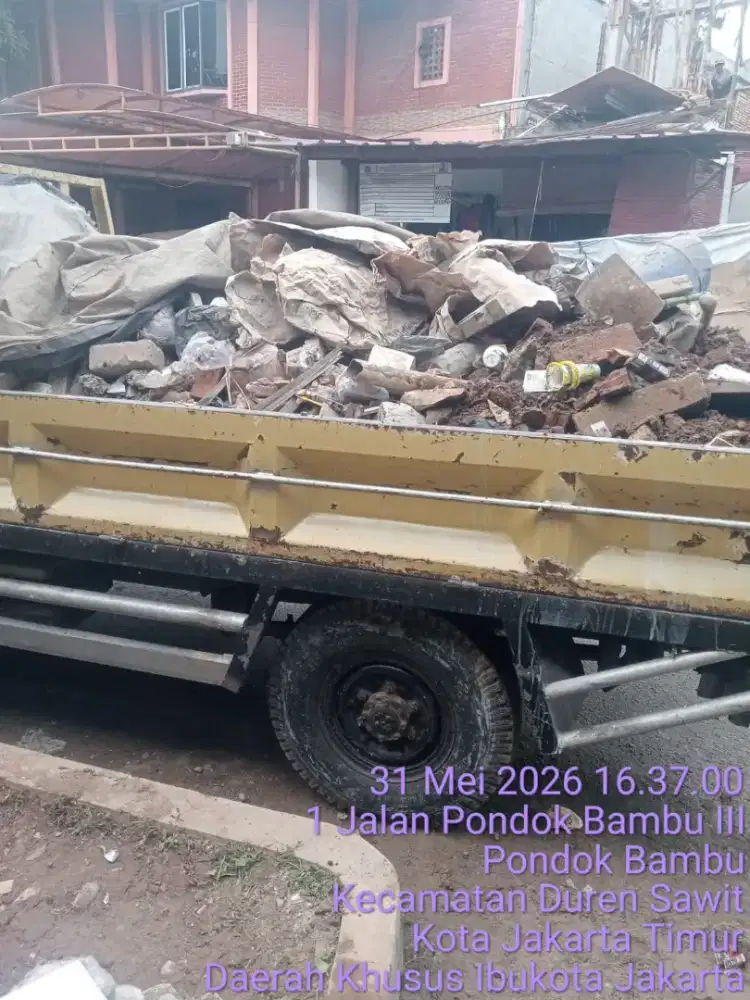 Jasa buang puing dan tanah