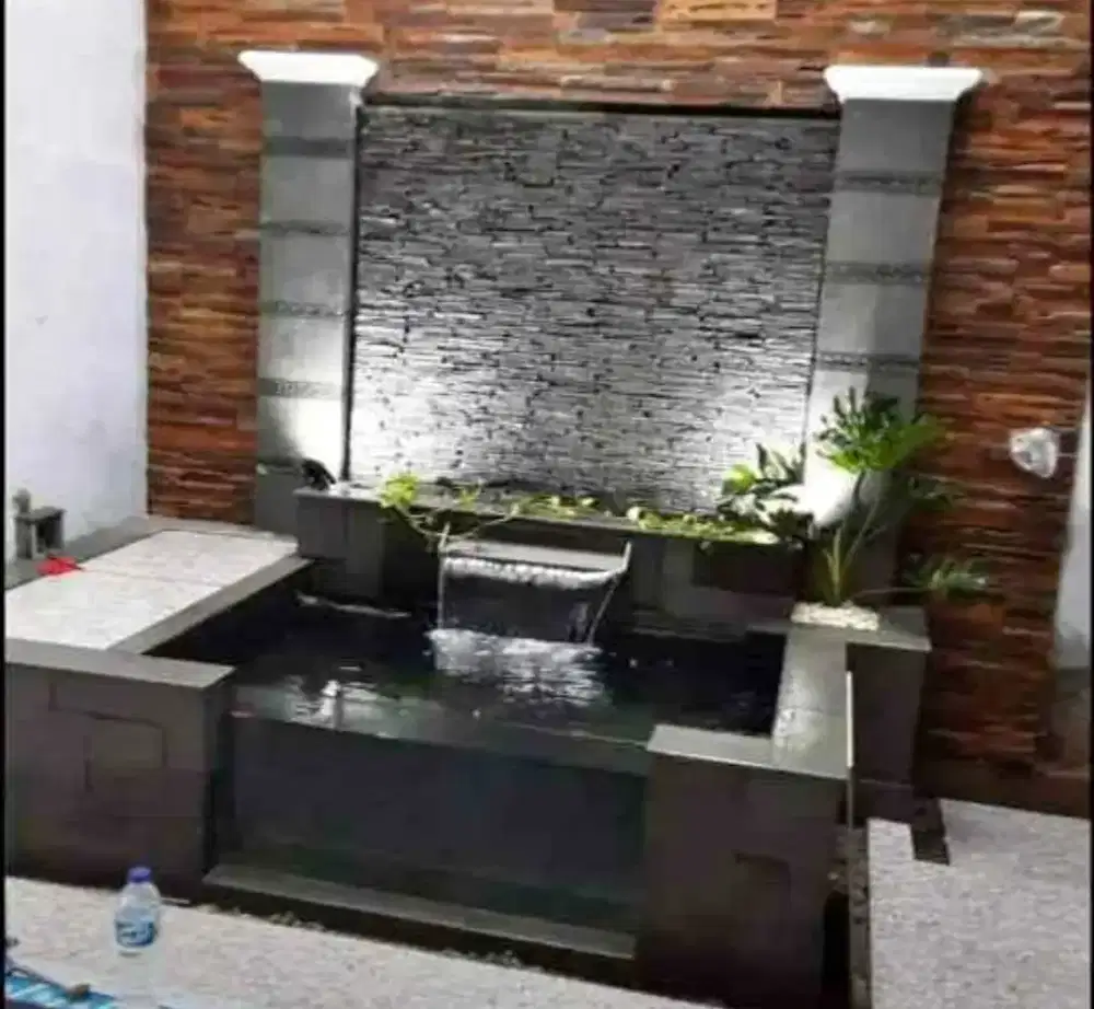 Kolam koi batu alam modern