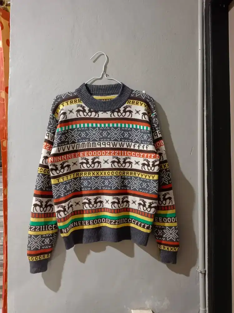 Atasan Sweater Motif