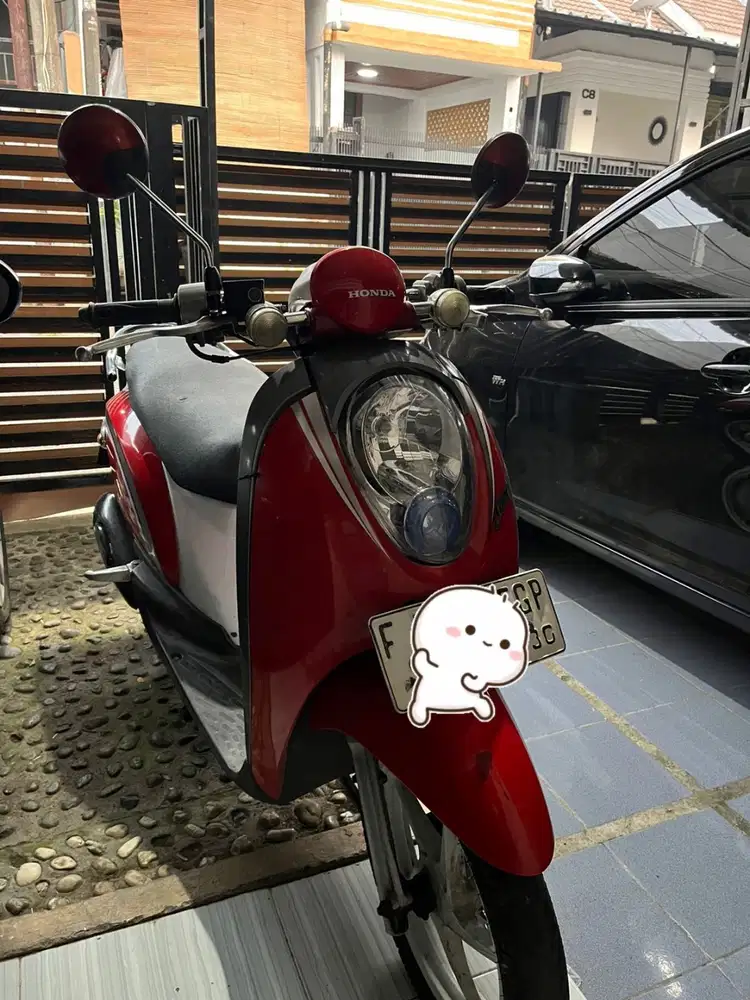 Honda Scoopy carbu 2012