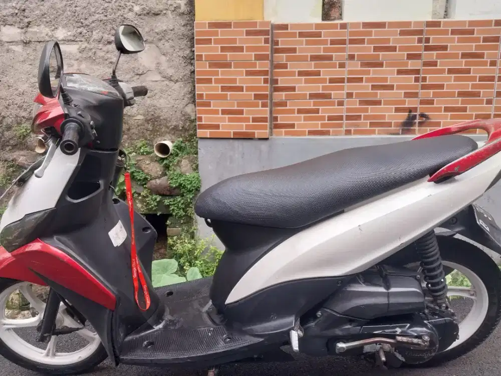 Di jual cepet motor mio j putih merah bisa nego.