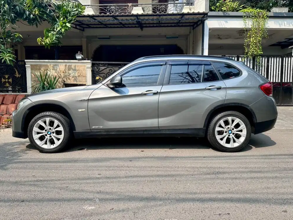 Bmw X1 E84 SDrive1.8i AT 2012 Grey Perl Metalic Pribadi orisinil nego