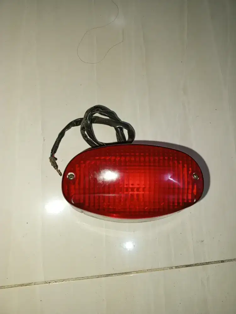 lampu stop Kawasaki BN125 orisinil