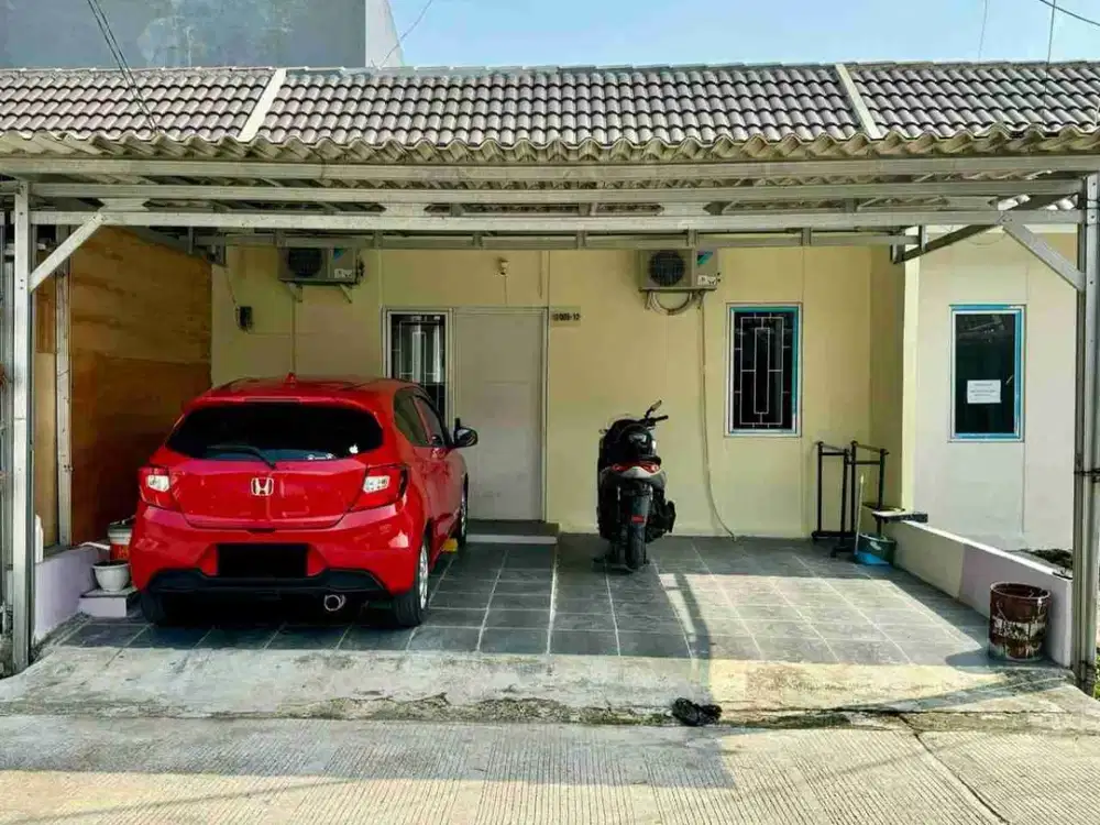 Dijual cepat
Rumah di mutiara gading city Cluater Madrid