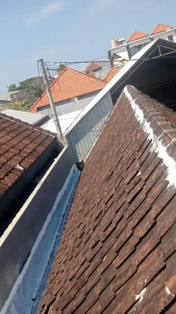 Perbaikan atap bicor