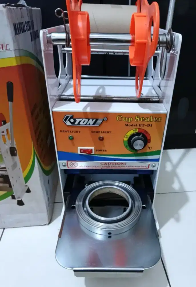 Mesin pres cup merk Ton