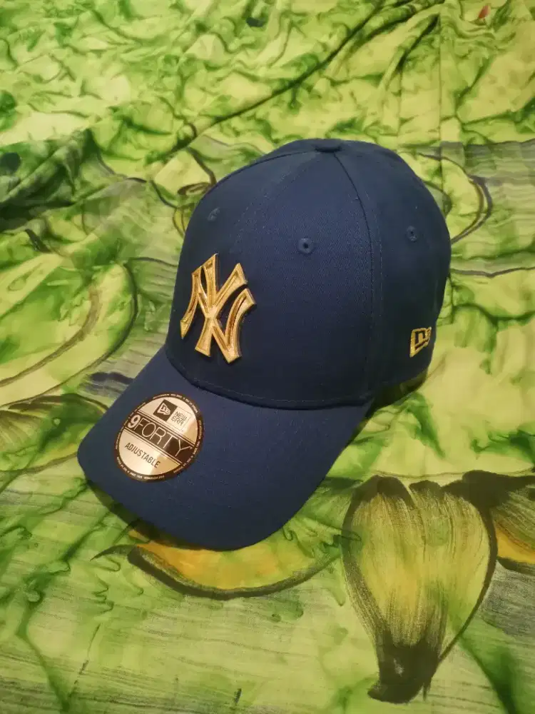 Topi NY logo Besi Emas/ NEW ERA/ Biru Navy (ORIGINAL)