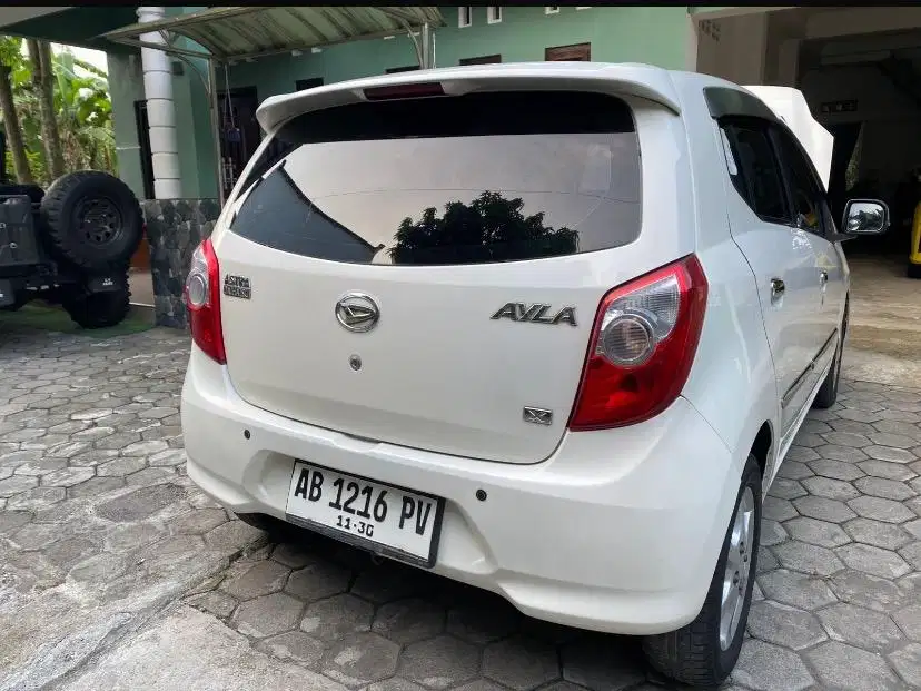 BU.DAIHATSU AYLA 2014 PEMAKAIAN PRIBADI BELI DARI BARU ISTIMEWA