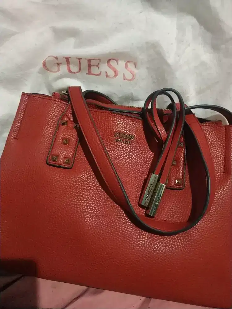 Guess Original red leather handbag.