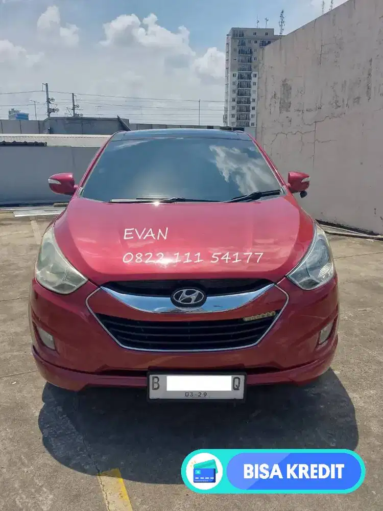Hyundai Tucson 2.0 XG Sunroof Panoramic AT Matic 2013 Merah Metalik.