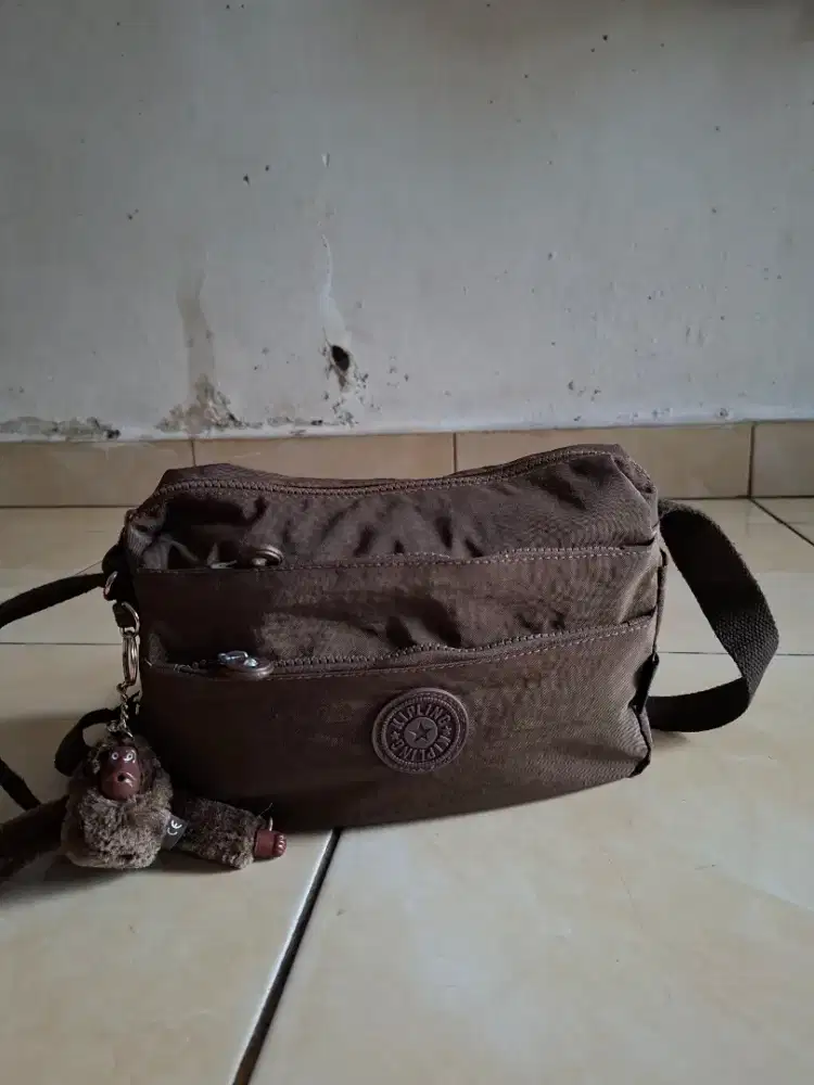 Tas kipling pria wanita