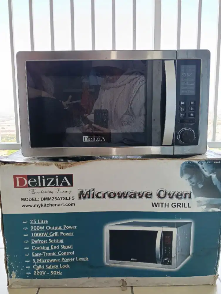 Micro oven Baru belum pernah pakai ,tipe liat di foto