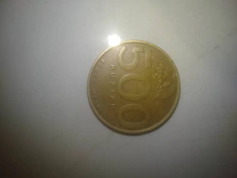 Uang coin 500 melati