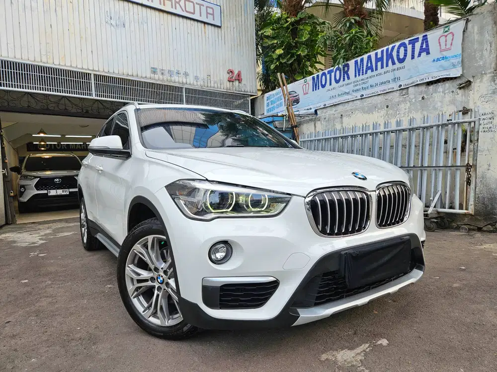 BMW X1 Panoramic Sdrive 1.8i Xline 2019 nik 2018 putih white F48 bagus